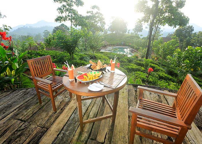 a dining table set up outside at 98 acres resort in sri lanka
