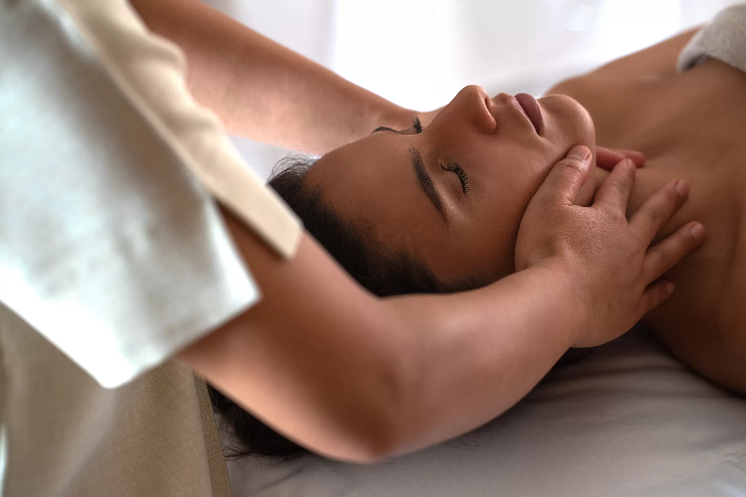 a women receiving a spa treatment at Jumeirah Saadiyat Island