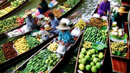 Browse Bangkok’s floating markets for unusual food - Savile Row Travel
